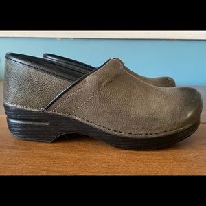 Worn once, size 9 (40) Dansko clogs in dark green